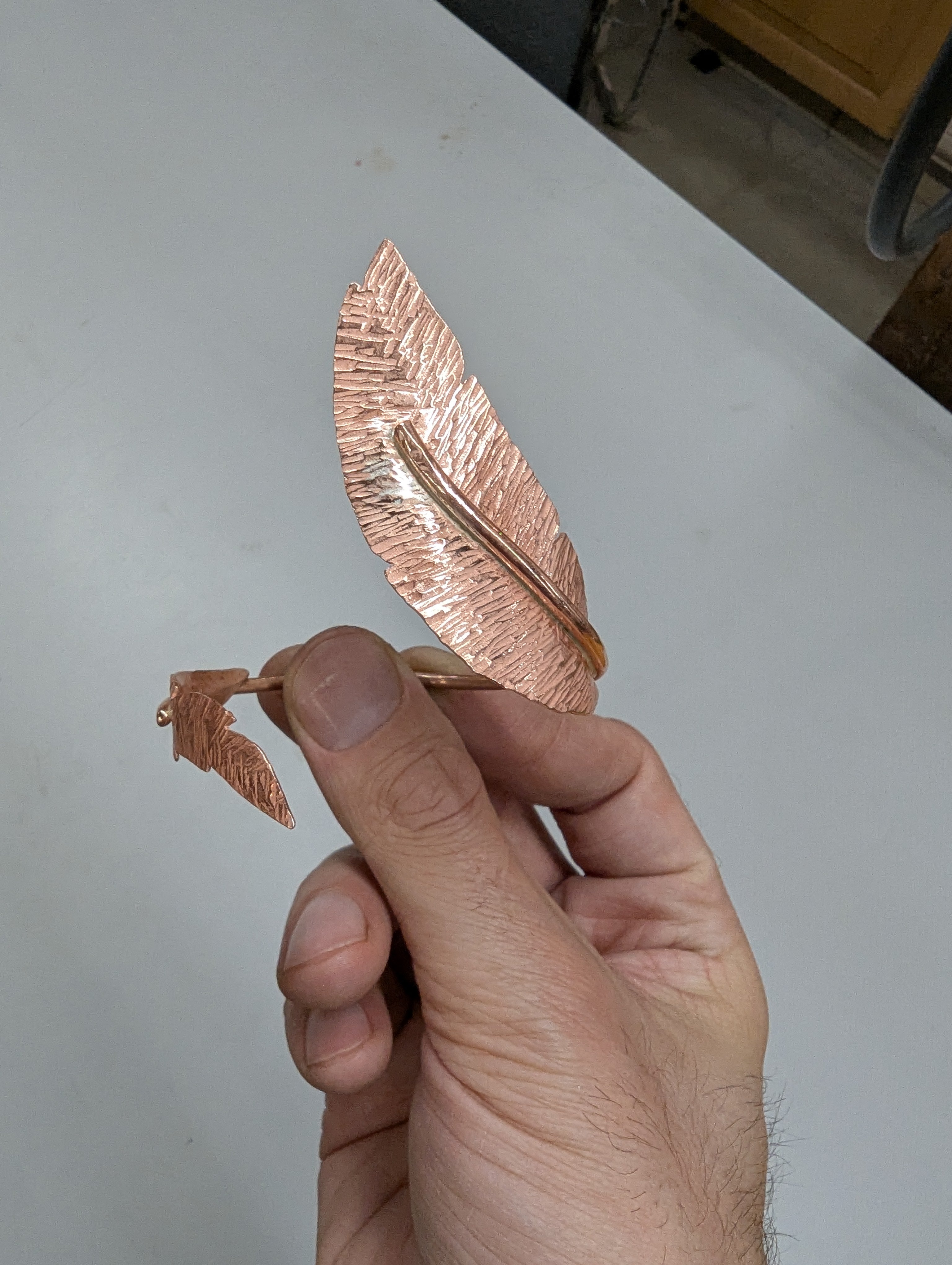 Work in Progress - Feather Cuffs