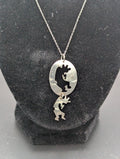 Kokopelli Light and Dark Pendant